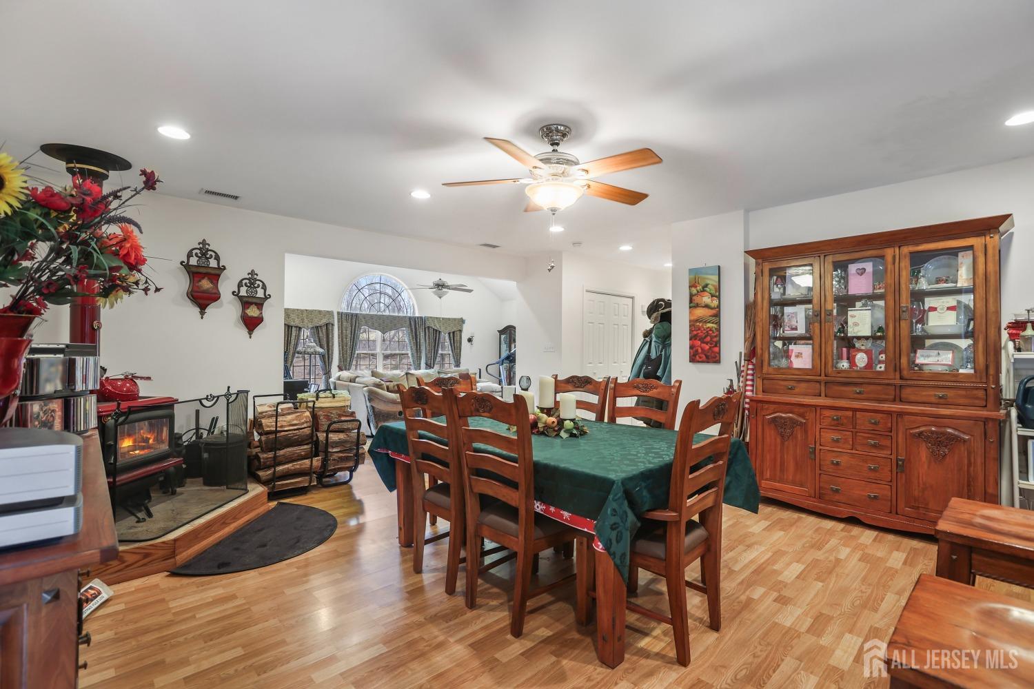 75 Baird Road Millstone Township, NJ 08535 - Photo 9 of 30 a view of a livingroom and dining room