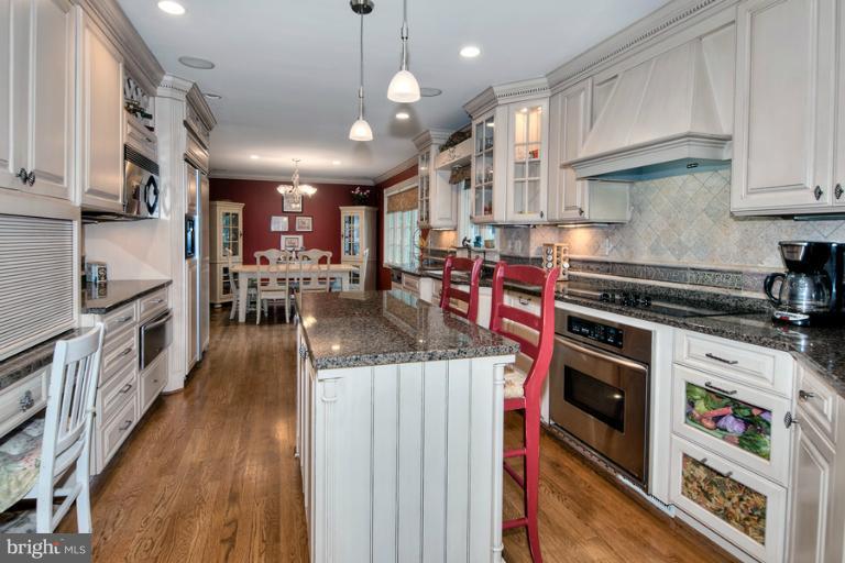 8717 Postoak Road Potomac, MD 20854 - Photo 4 of 22 Updated Gourmet Kitchen w/Center Island