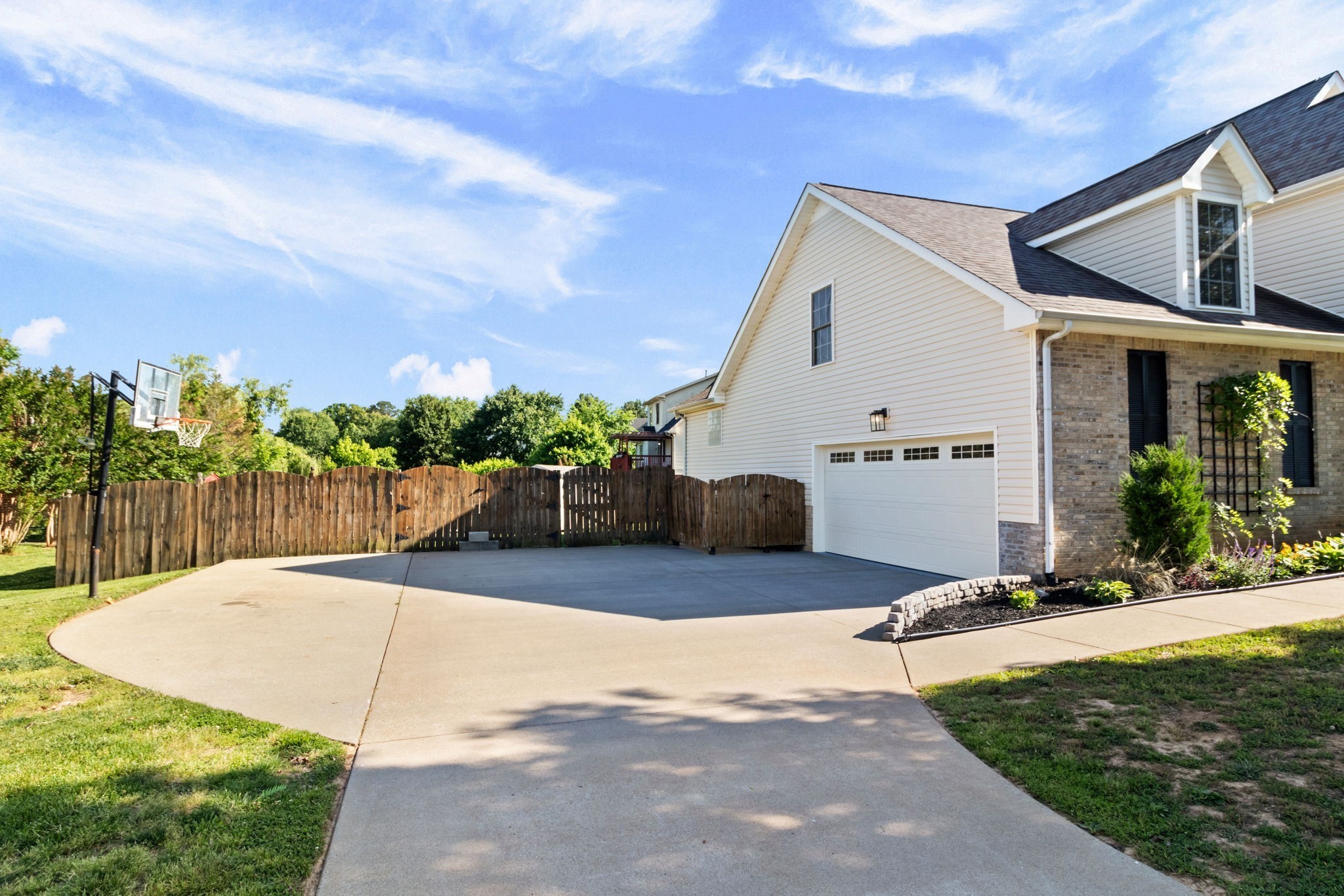 3572 Rabbit Run Trail Adams, TN 37010 - Photo 31 of 44 a view of a house with backyard and sitting area