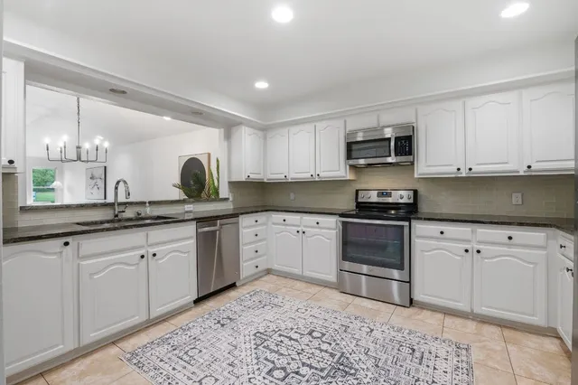 $395,000 | 11127 Pinehurst Drive, Unit E, Austin, TX 78747