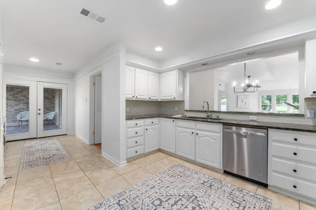 $395,000 | 11127 Pinehurst Drive, Unit E, Austin, TX 78747