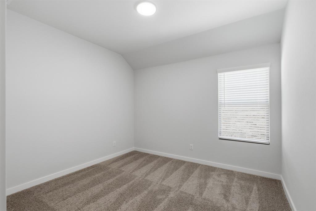637 Sierra Ridge Lavon, TX 75166 - Photo 15 of 26 an empty room with a window