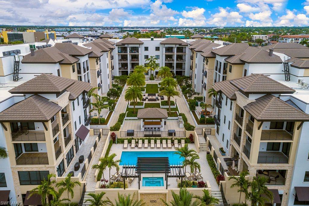 1130 3rd Avenue South, Unit 105 Naples, FL 34102 - Photo 5 of 9 a view of a city with a building in the background