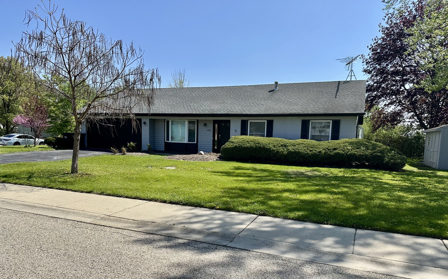 a house view with a garden space
