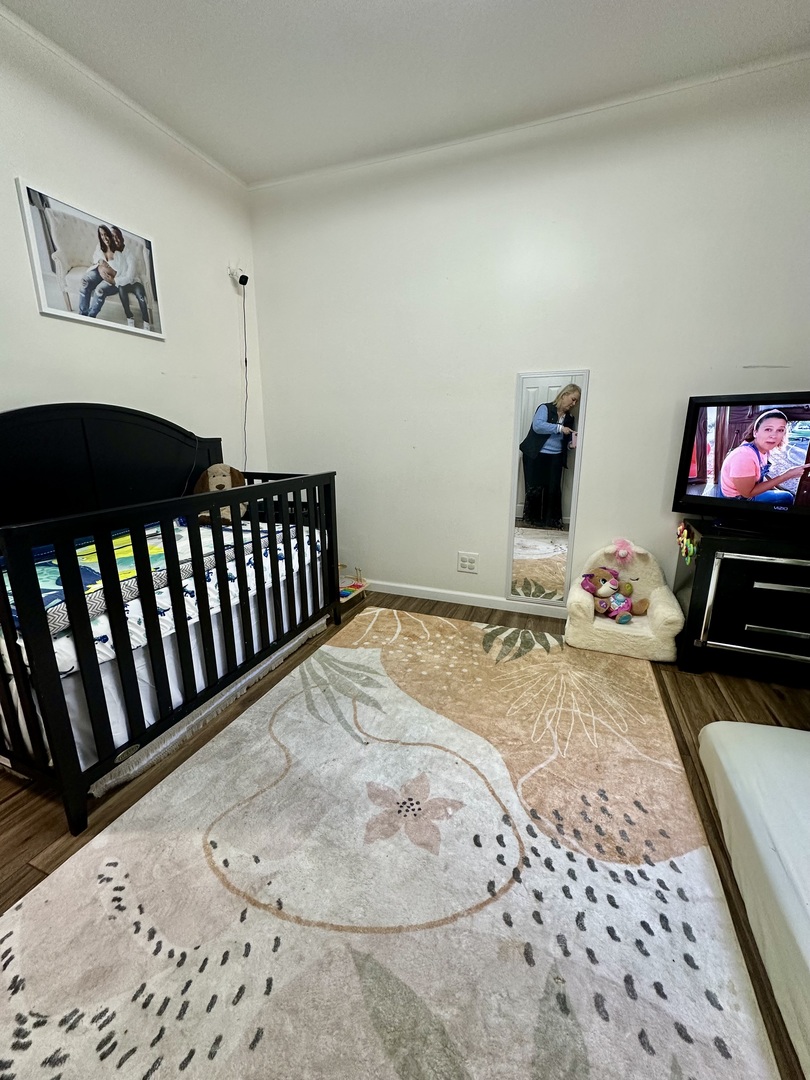 440 Red Bridge Road Lake Zurich, IL 60047 - Photo 11 of 33 a bedroom with a bed and wooden floor