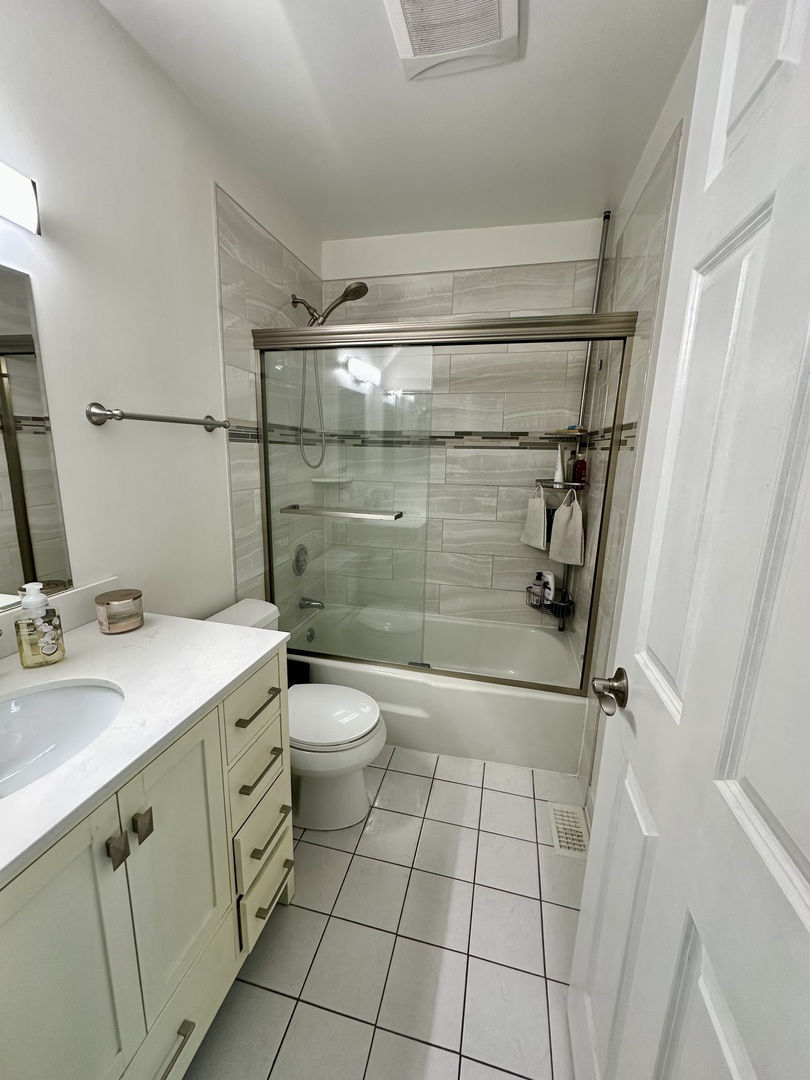 440 Red Bridge Road Lake Zurich, IL 60047 - Photo 19 of 33 a bathroom with a granite countertop sink toilet and shower