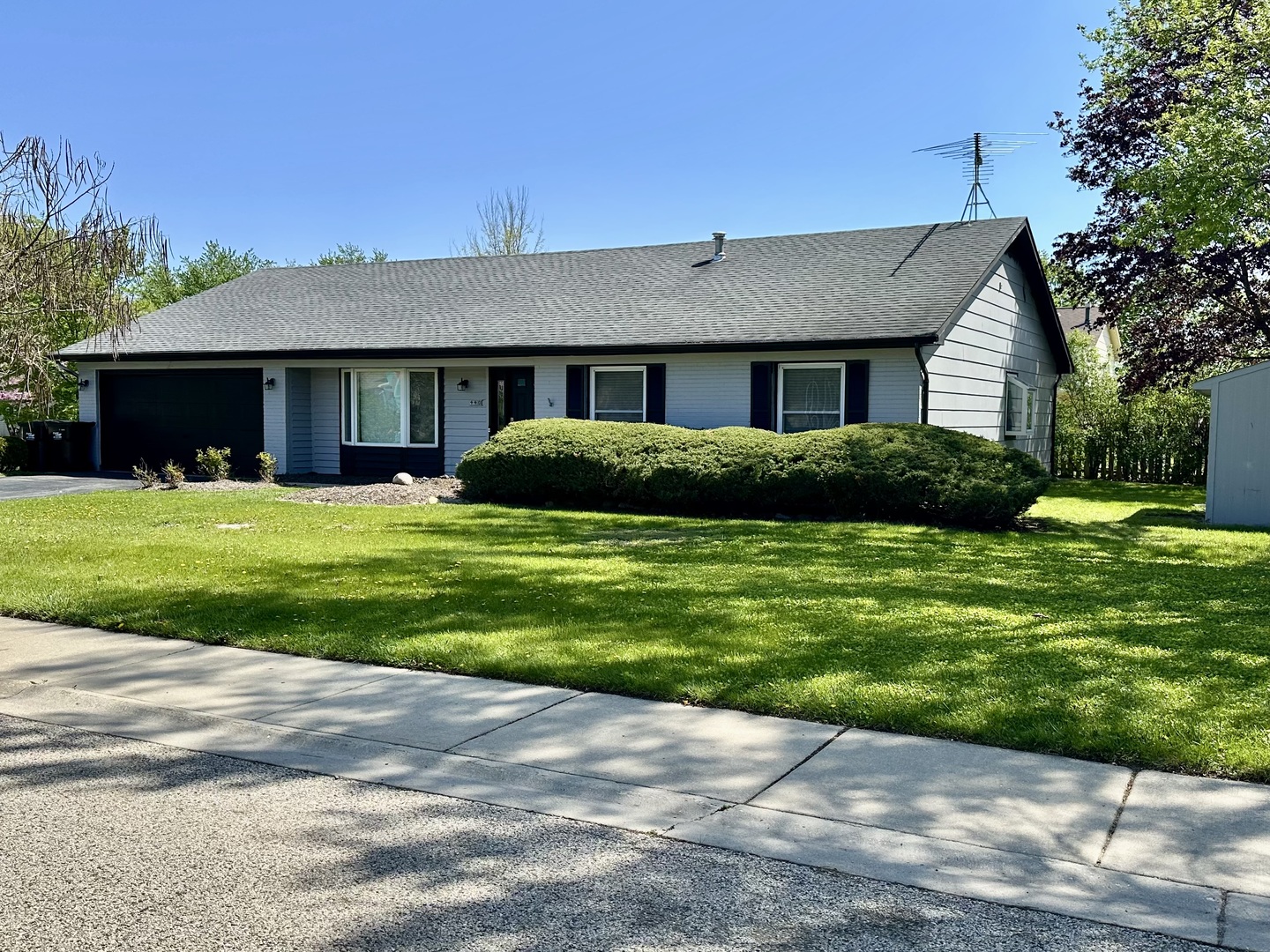 440 Red Bridge Road Lake Zurich, IL 60047 - Photo 2 of 33 a front view of a house with a yard and garage