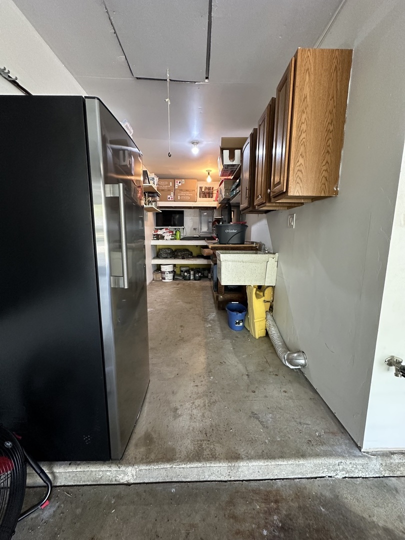 440 Red Bridge Road Lake Zurich, IL 60047 - Photo 26 of 33 a kitchen with stainless steel appliances granite countertop a refrigerator a stove and a sink