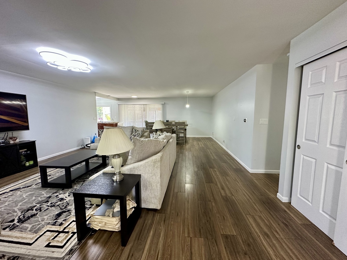 440 Red Bridge Road Lake Zurich, IL 60047 - Photo 3 of 33 a living room with furniture and a wooden floor
