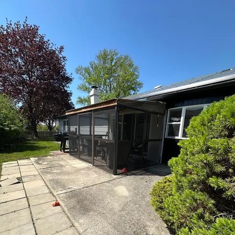 a front view of house with yard