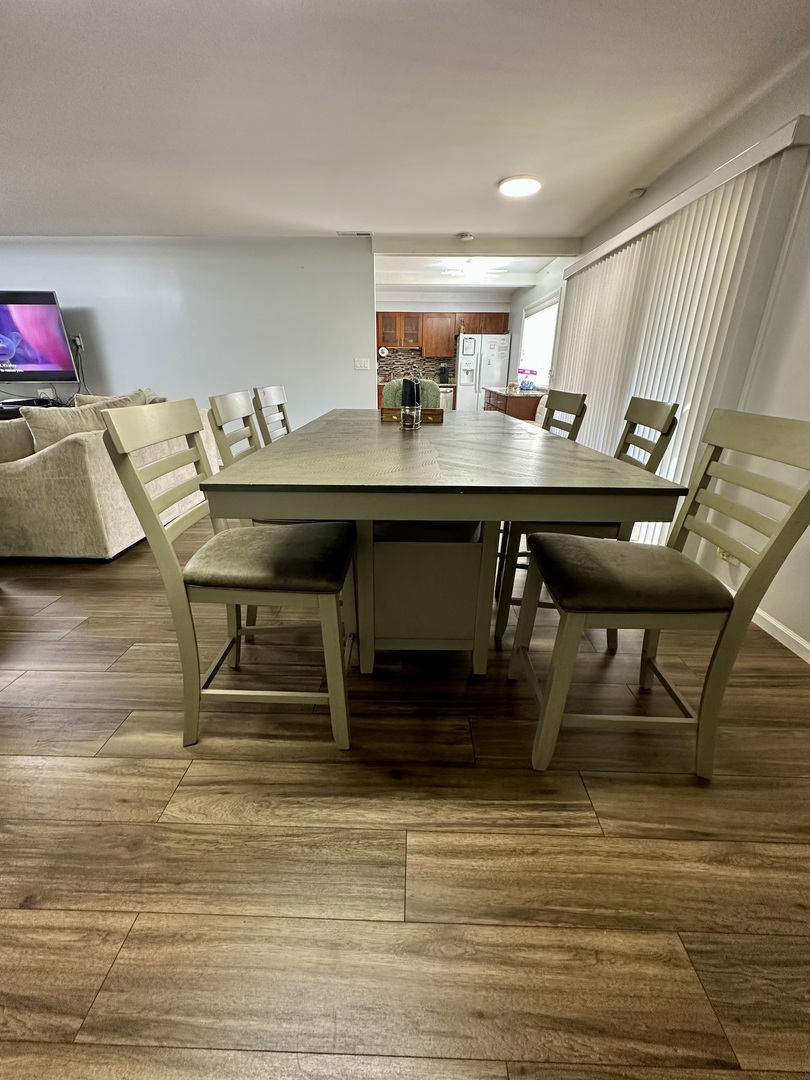 440 Red Bridge Road Lake Zurich, IL 60047 - Photo 7 of 33 a view of a dining room with furniture and window