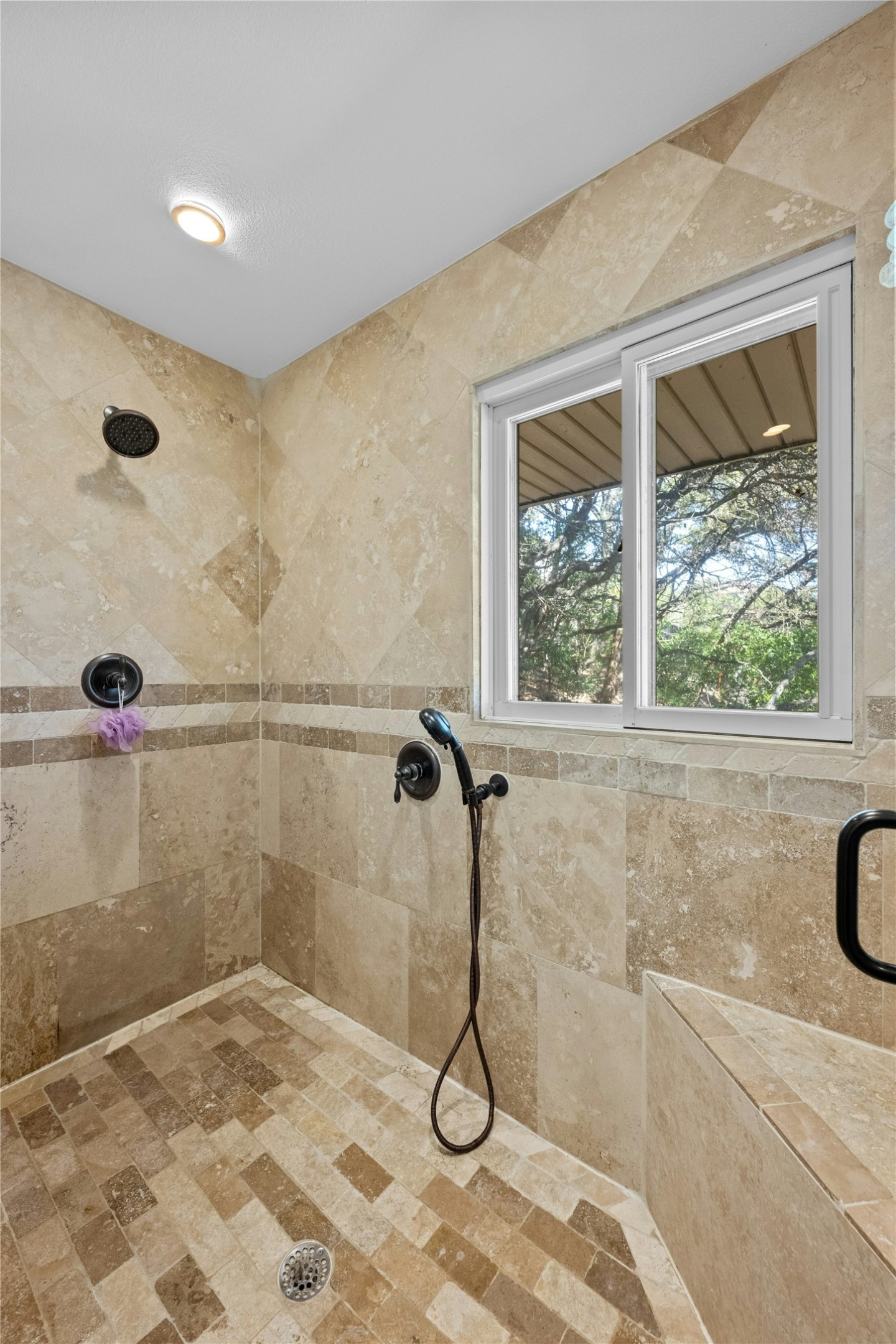 1603 Twilight Ridge Drive Austin, TX 78746 - Photo 18 of 34 a bathroom with a shower