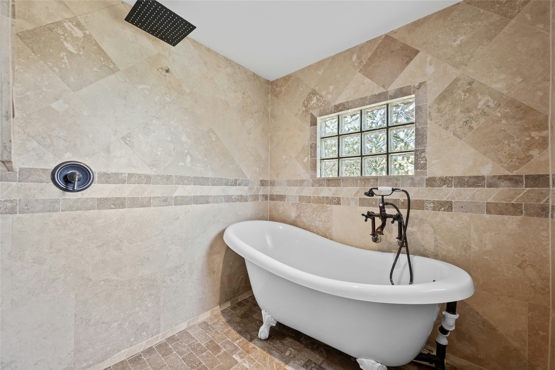 1603 Twilight Ridge Drive Austin, TX 78746 - Photo 22 of 34 a bathroom with a sink