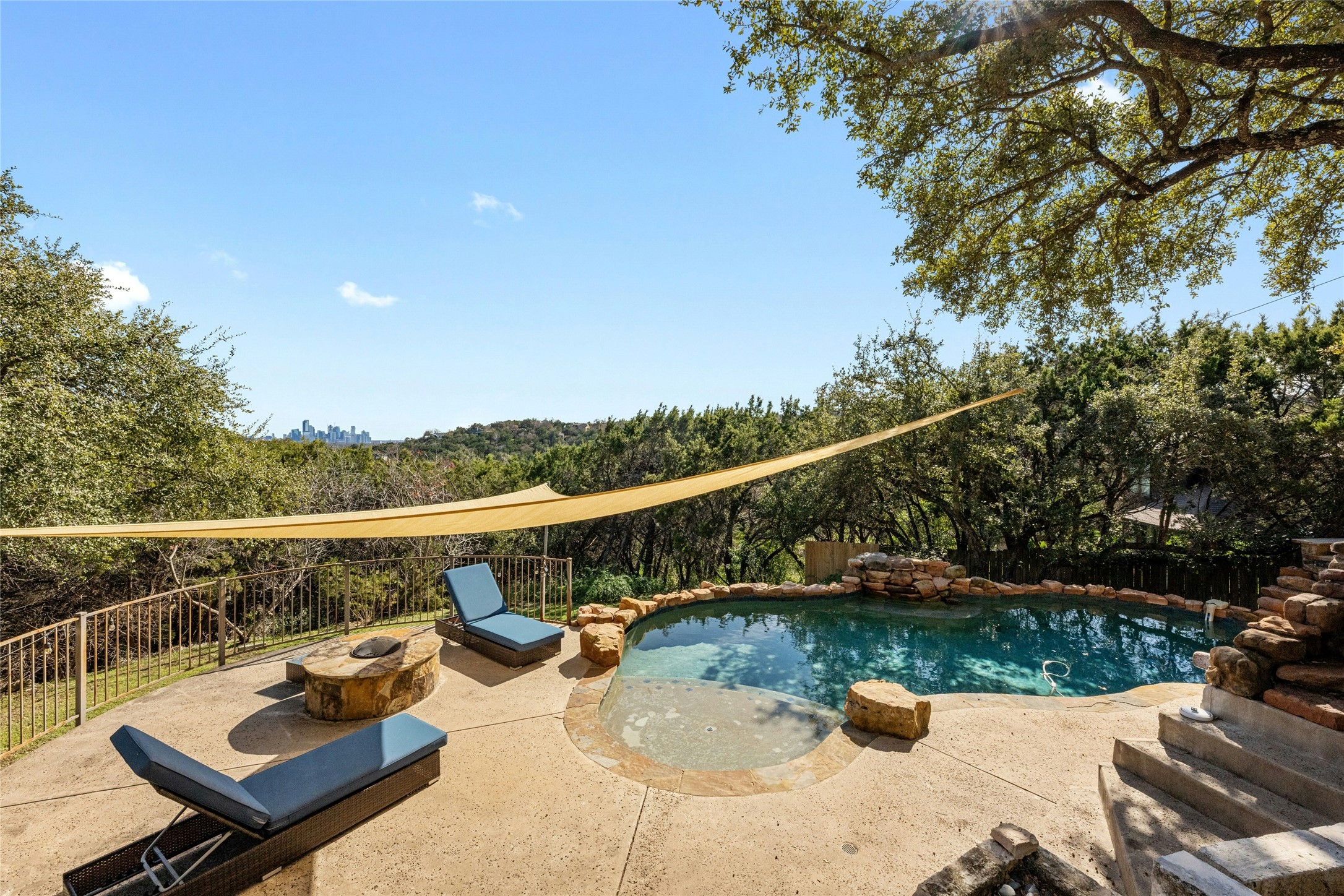1603 Twilight Ridge Drive Austin, TX 78746 - Photo 28 of 34 a view of a lake with couches in roof deck