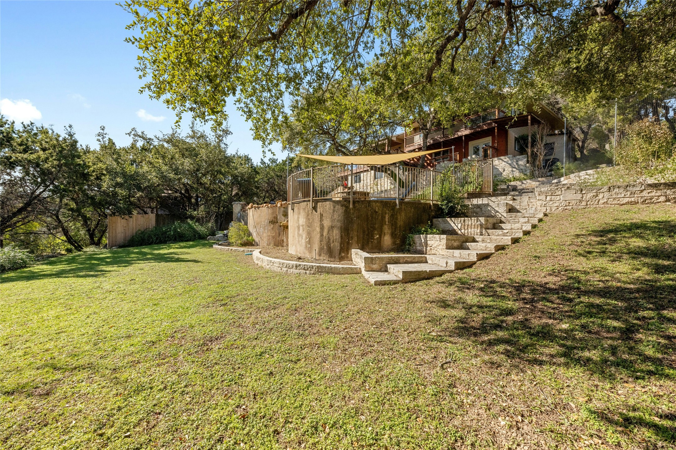 1603 Twilight Ridge Drive Austin, TX 78746 - Photo 30 of 34 a view of a yard with swimming pool