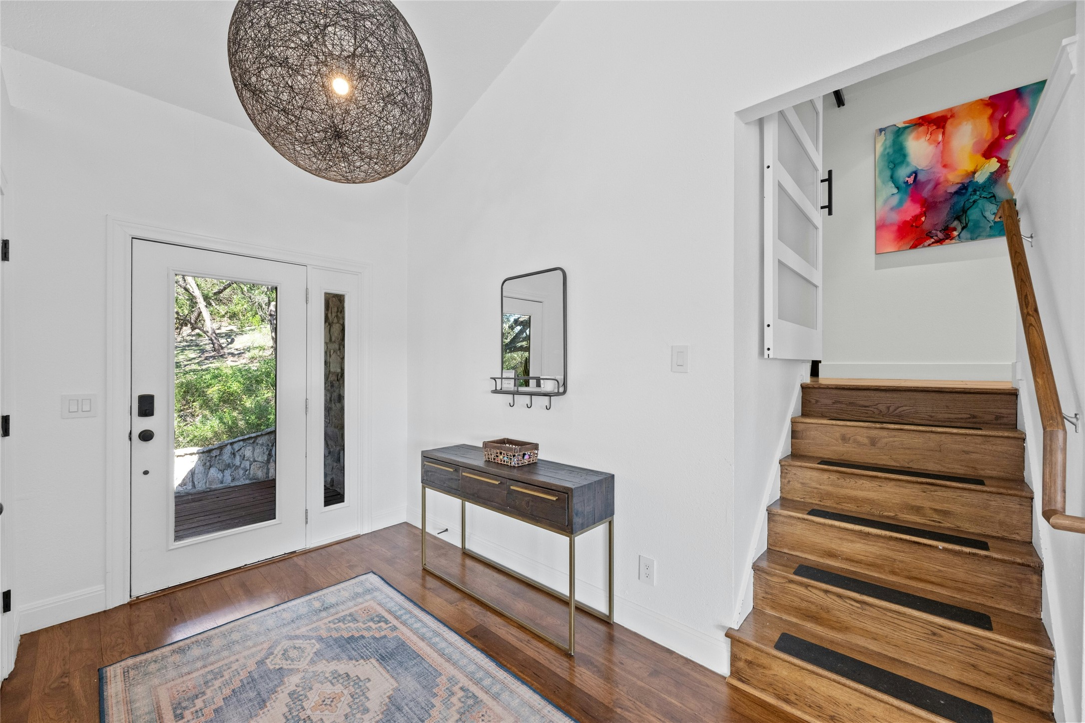 1603 Twilight Ridge Drive Austin, TX 78746 - Photo 3 of 34 a view of an entryway with wooden floor