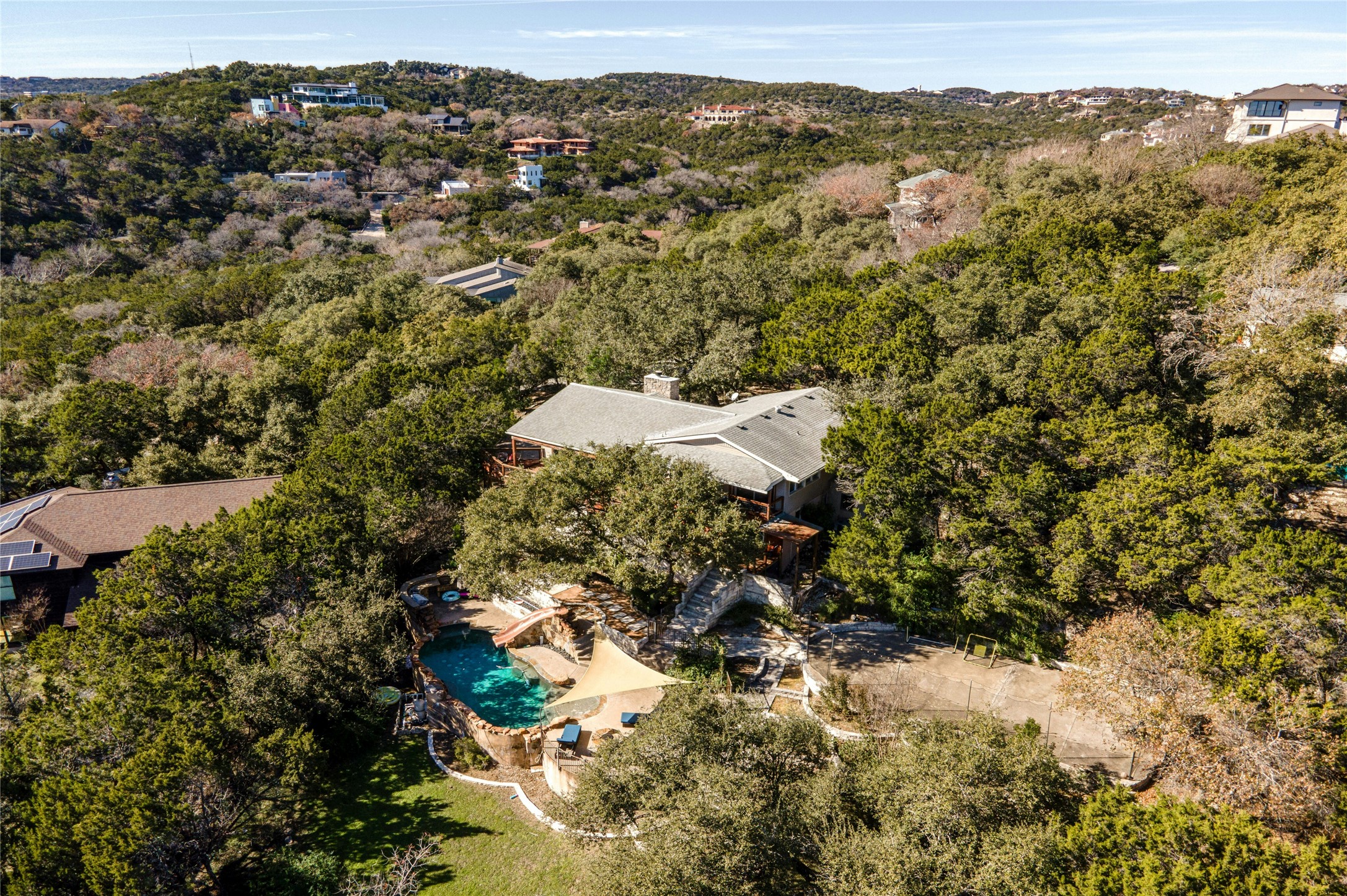 1603 Twilight Ridge Drive Austin, TX 78746 - Photo 34 of 34 a view of a forest with a mountain