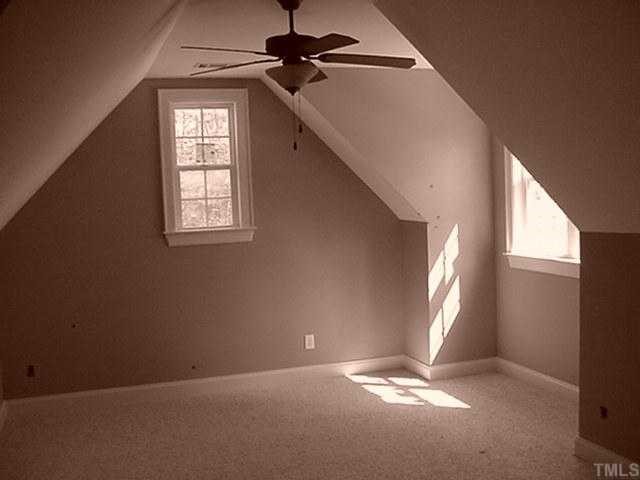 39 High Ridge Court Willow Spring, NC 27592 - Photo 6 of 8 an empty room with windows