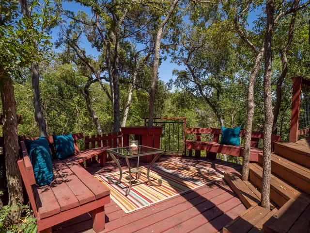 a view of outdoor sitting area with furniture