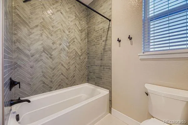 a bathroom with a white bathtub