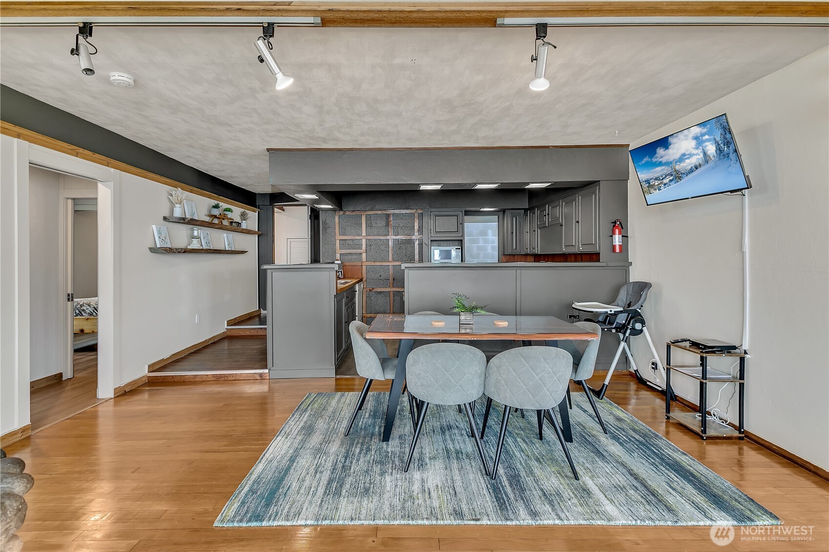 14024 Glen Acres Road Southwest Vashon, WA 98070 - Photo 11 of 40 a dining room with furniture and wooden floor
