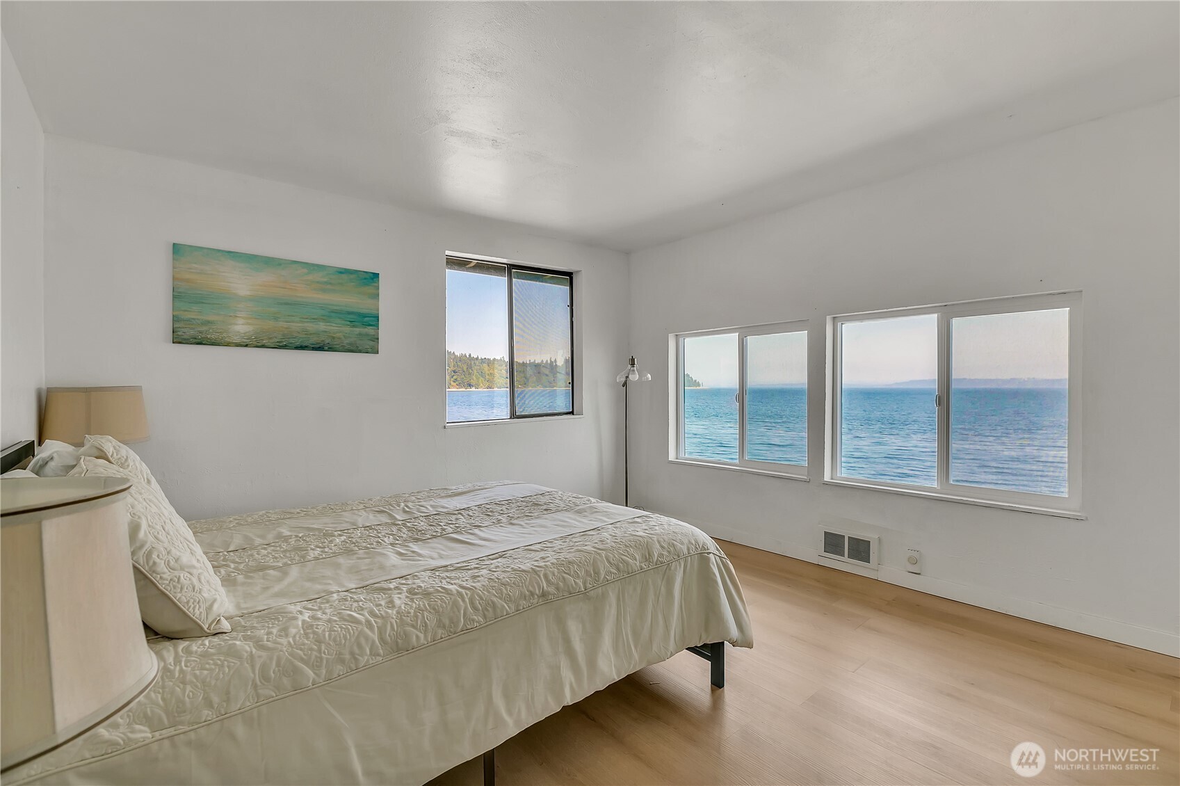 14024 Glen Acres Road Southwest Vashon, WA 98070 - Photo 21 of 40 a bedroom with a bed and a window
