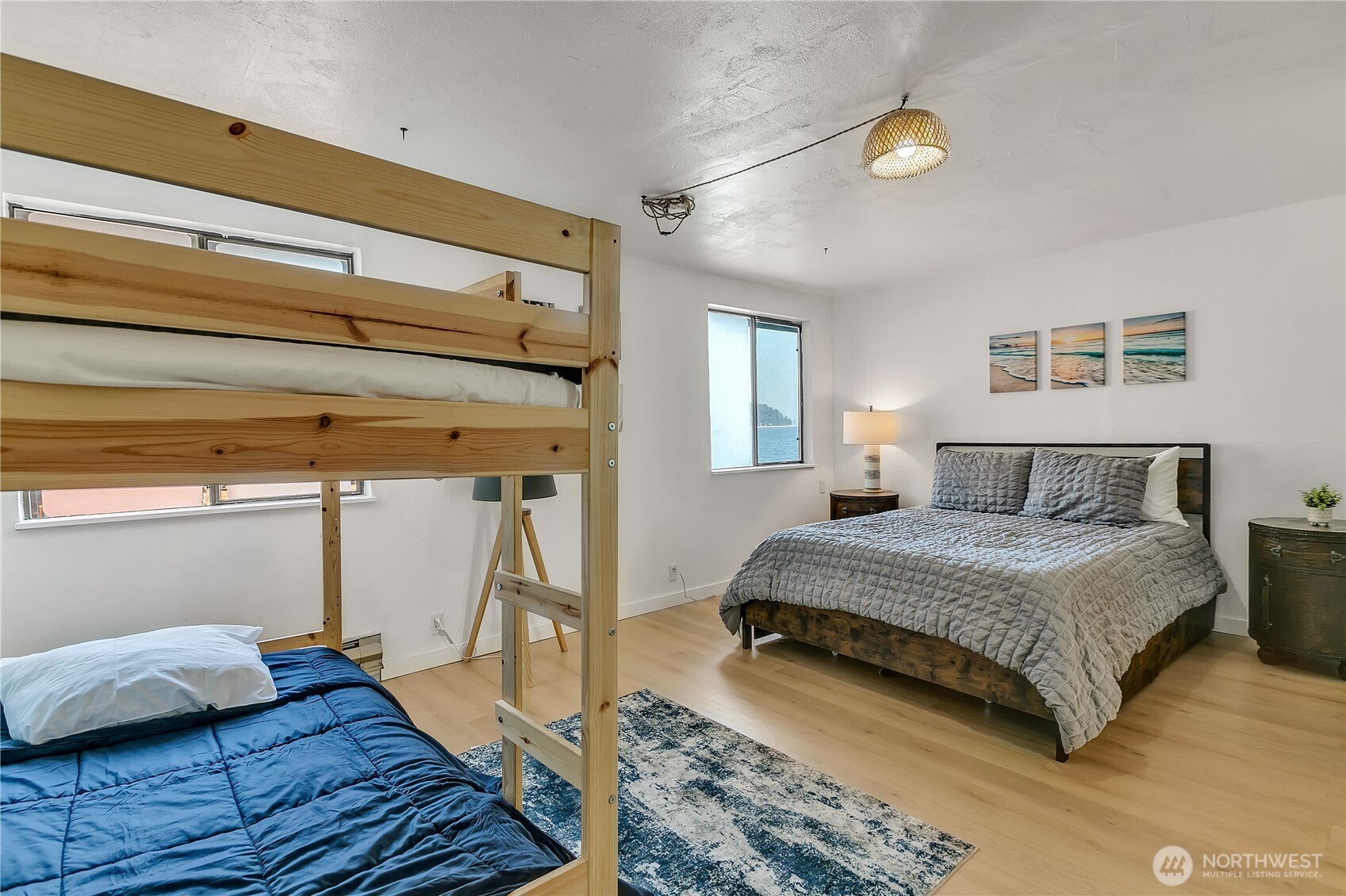 14024 Glen Acres Road Southwest Vashon, WA 98070 - Photo 22 of 40 a bedroom with a bed and a window