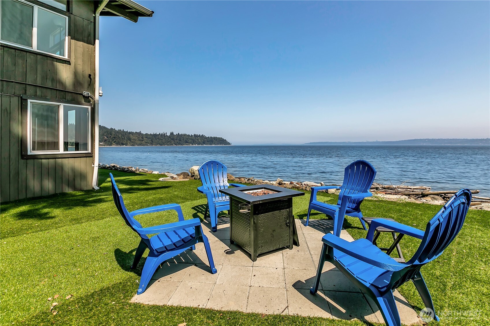 14024 Glen Acres Road Southwest Vashon, WA 98070 - Photo 25 of 40 a roof deck with a couple of chairs