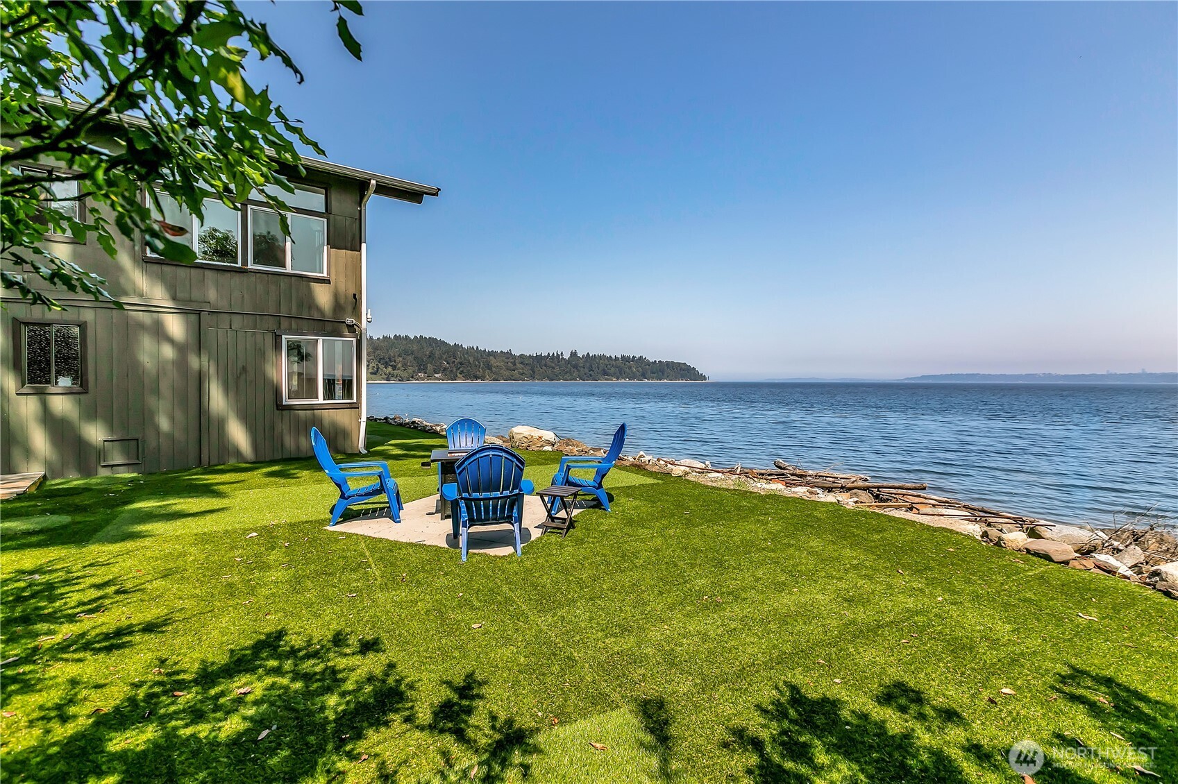 14024 Glen Acres Road Southwest Vashon, WA 98070 - Photo 26 of 40 a view of a lake with a patio