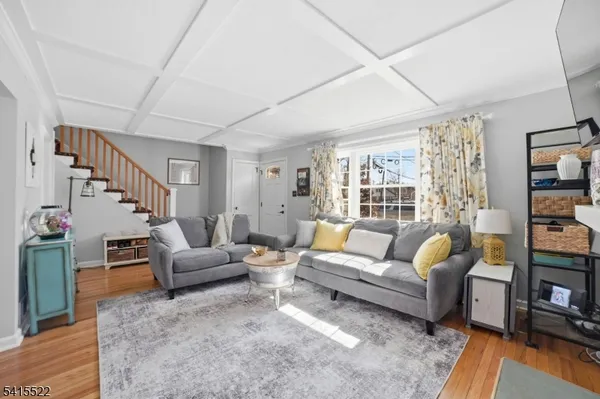 a living room with a couch and a fireplace