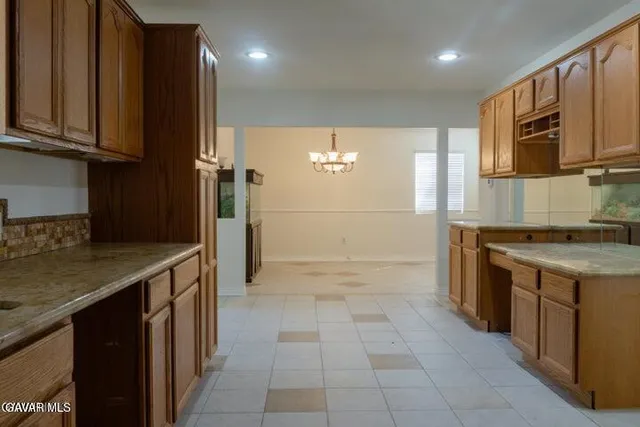 an empty room with a fireplace