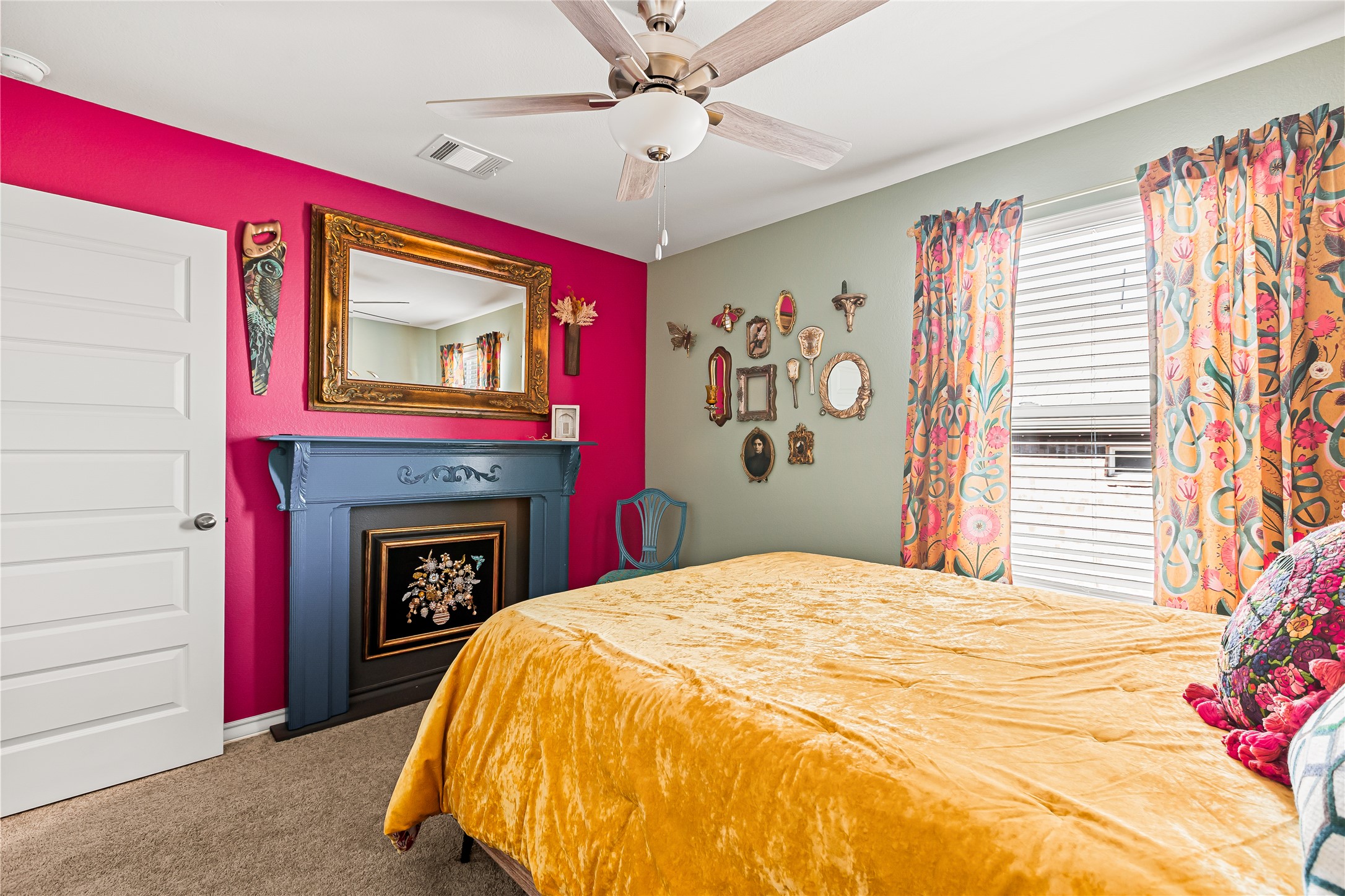 862 Pepperbark Loop Buda, TX 78610 - Photo 25 of 40 a bed room with a bed and a fireplace