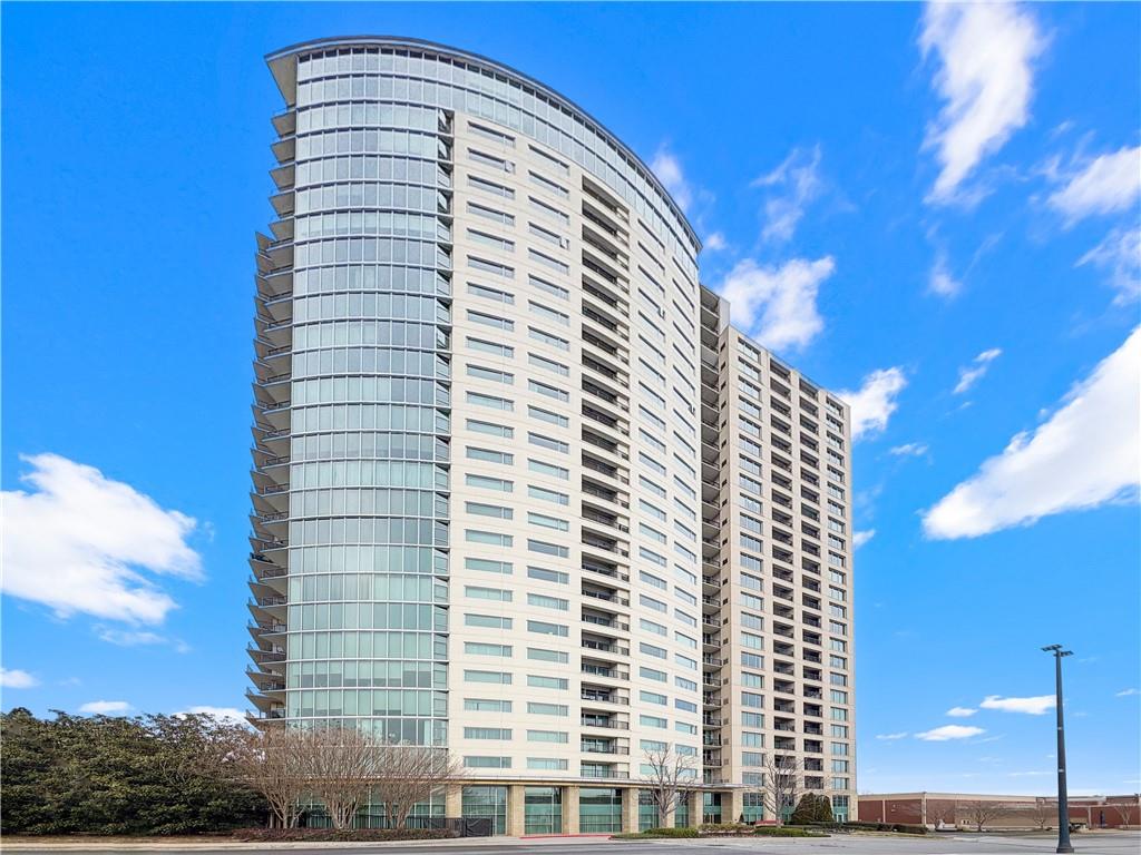 4561 Olde Perimeter Way, Unit 2707 Atlanta, GA 30346 - Photo 1 of 1 a view of a tall building