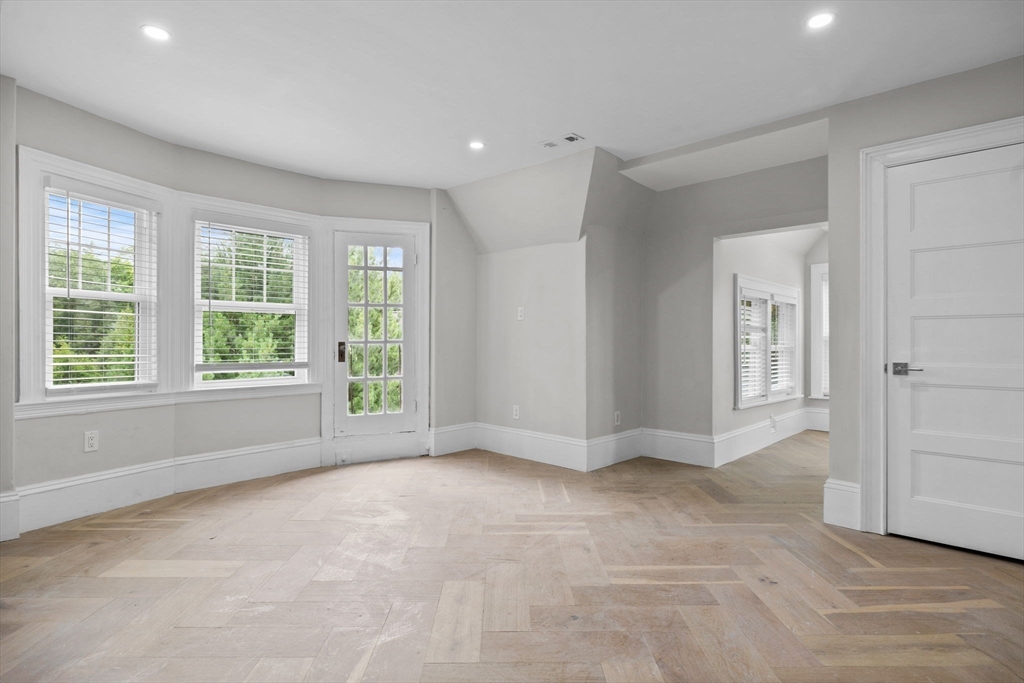 476 Heath Street Brookline, MA 02467 - Photo 24 of 41 a view of an empty room with a window