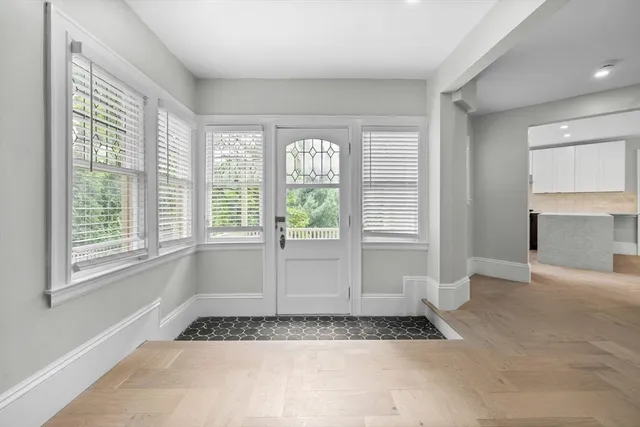 a view of a livingroom with furniture and window