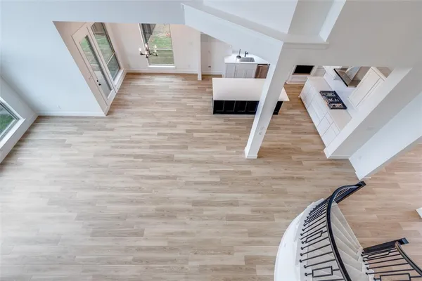 a view of an entryway with wooden floor