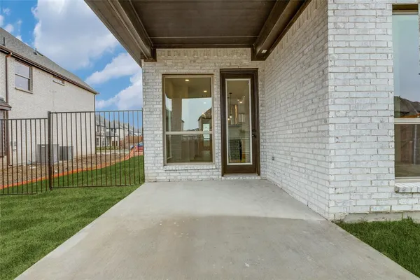 a view of a porch with a backyard
