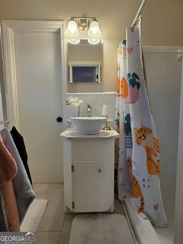 a living room with furniture fireplace and a flat screen tv