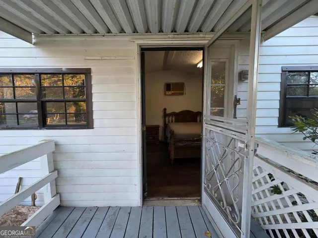 a bedroom with a bed and a closet