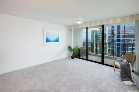 a view of livingroom with furniture and floor to ceiling window
