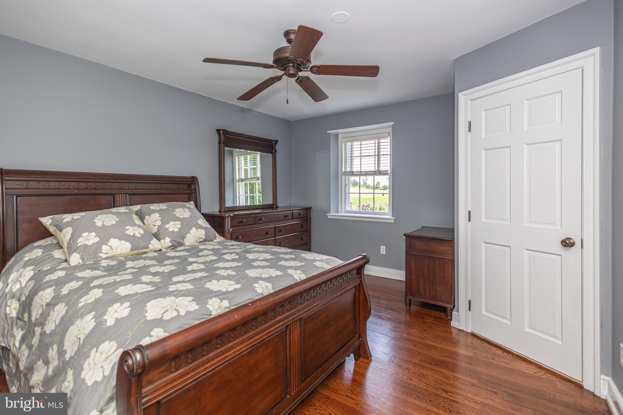 2101 Street Road New Hope, PA 18938 - Photo 53 of 100 a bed sitting in a bedroom next to a window