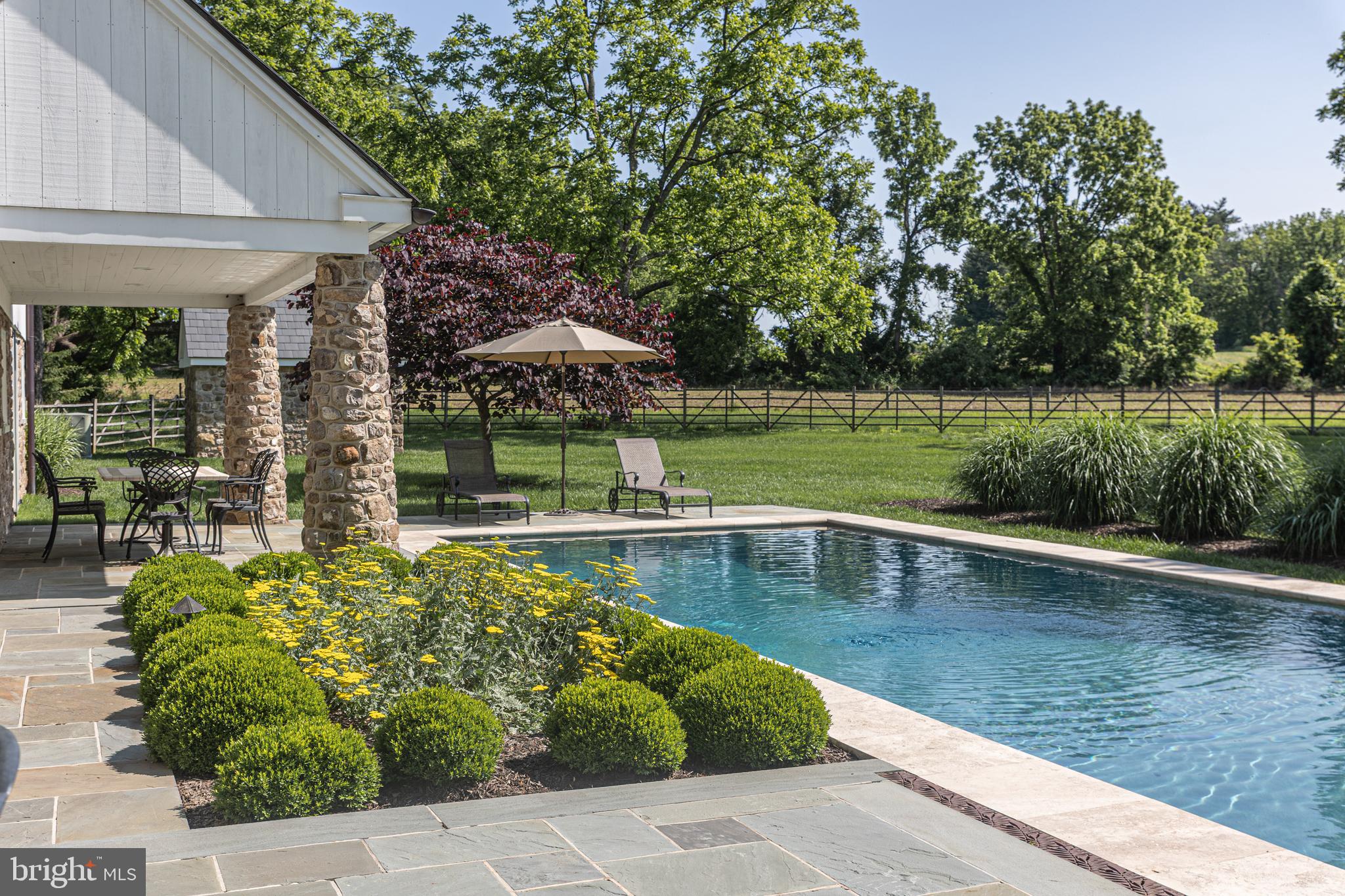 2101 Street Road New Hope, PA 18938 - Photo 81 of 100 a view of a swimming pool with a patio