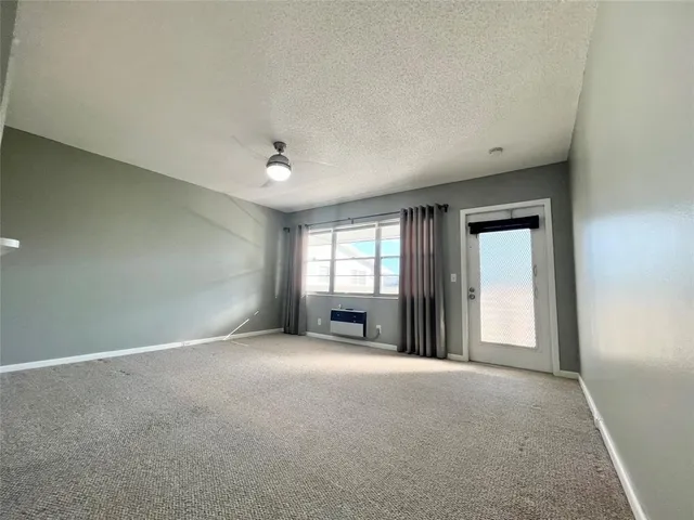 a view of a livingroom with a staircase