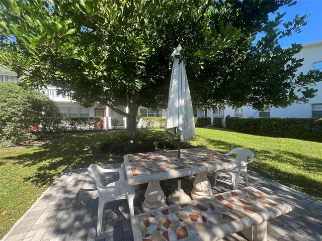 a view of a yard from a balcony