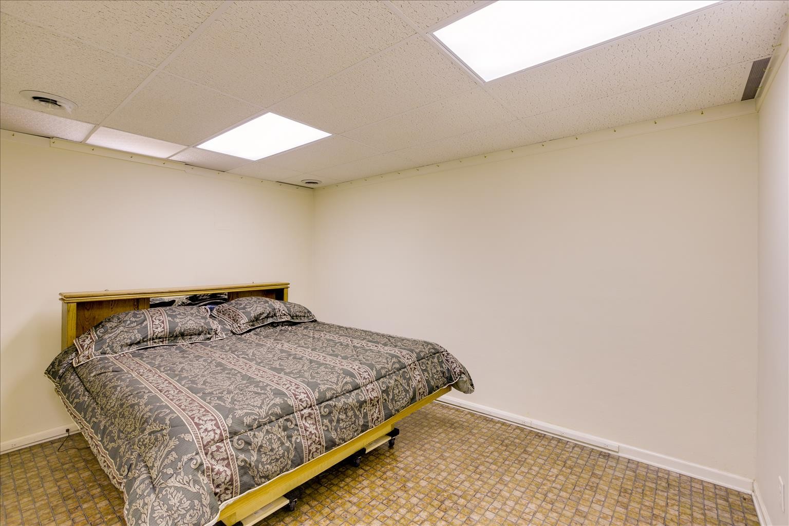 2128 Double Branch Road Columbia, TN 38401 - Photo 14 of 31 a bedroom with a bed and a window