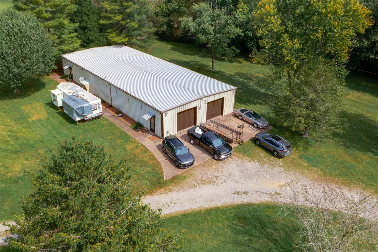 2128 Double Branch Road Columbia, TN 38401 - Photo 22 of 31 an aerial view of a house with yard and patio