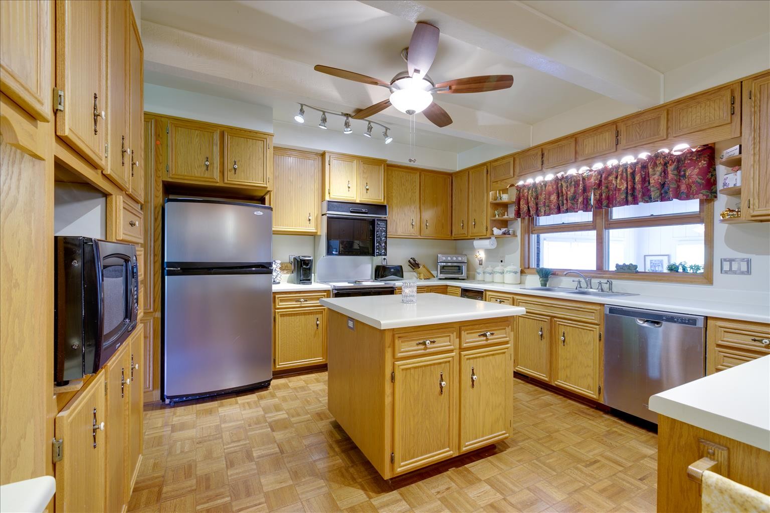 2128 Double Branch Road Columbia, TN 38401 - Photo 5 of 31 a kitchen with a stove a refrigerator and a sink