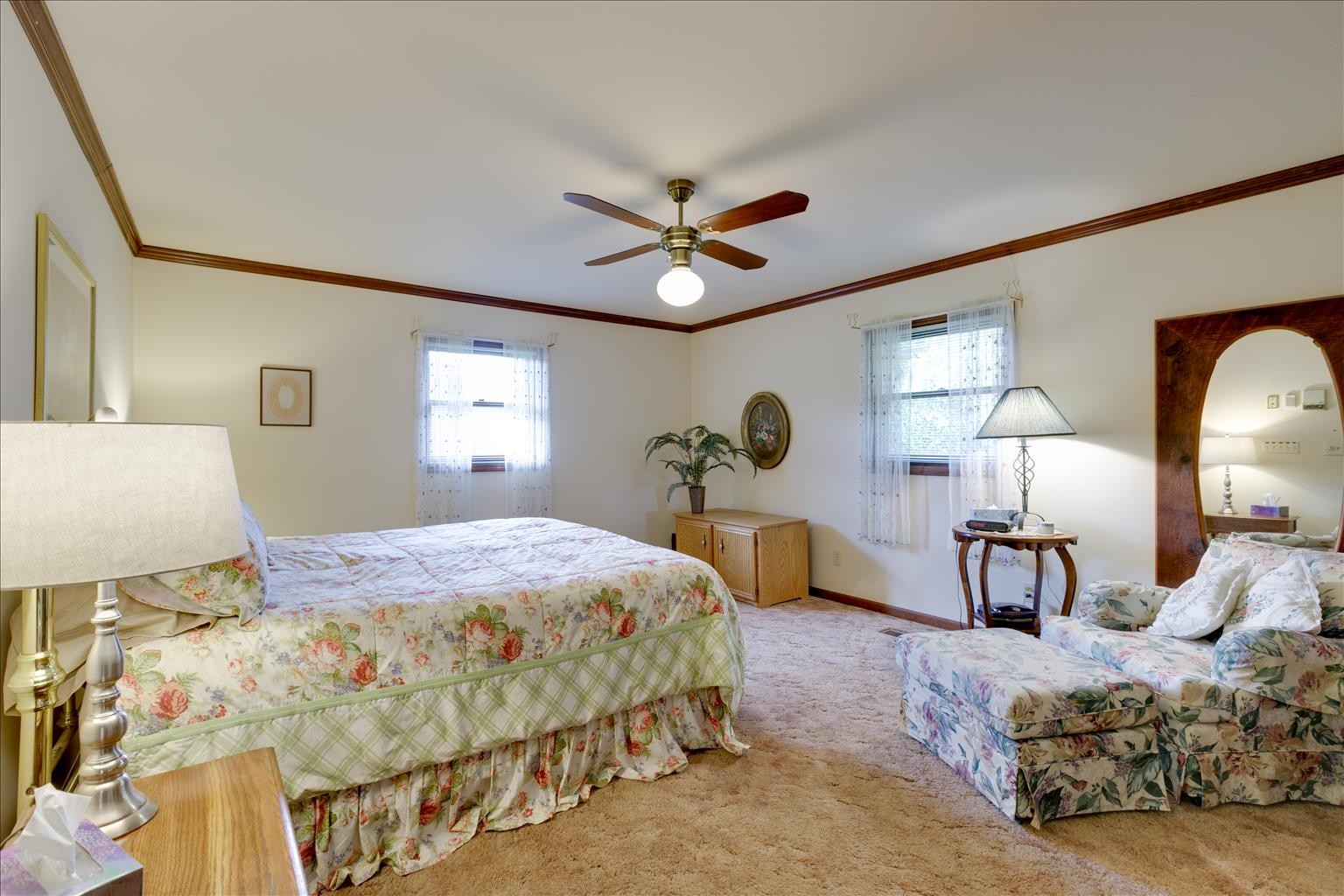 2128 Double Branch Road Columbia, TN 38401 - Photo 8 of 31 a bedroom with a bed a chandelier and window
