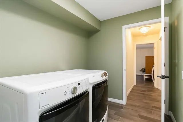 a utility room with washer and dryer