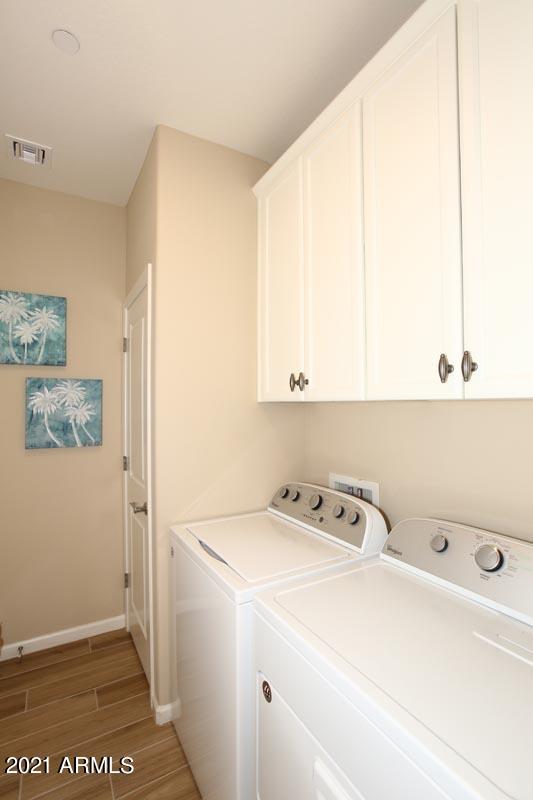 3935 East Rough Rider Road, Unit 1373 Phoenix, AZ 85050 - Photo 13 of 50 Laundry Room